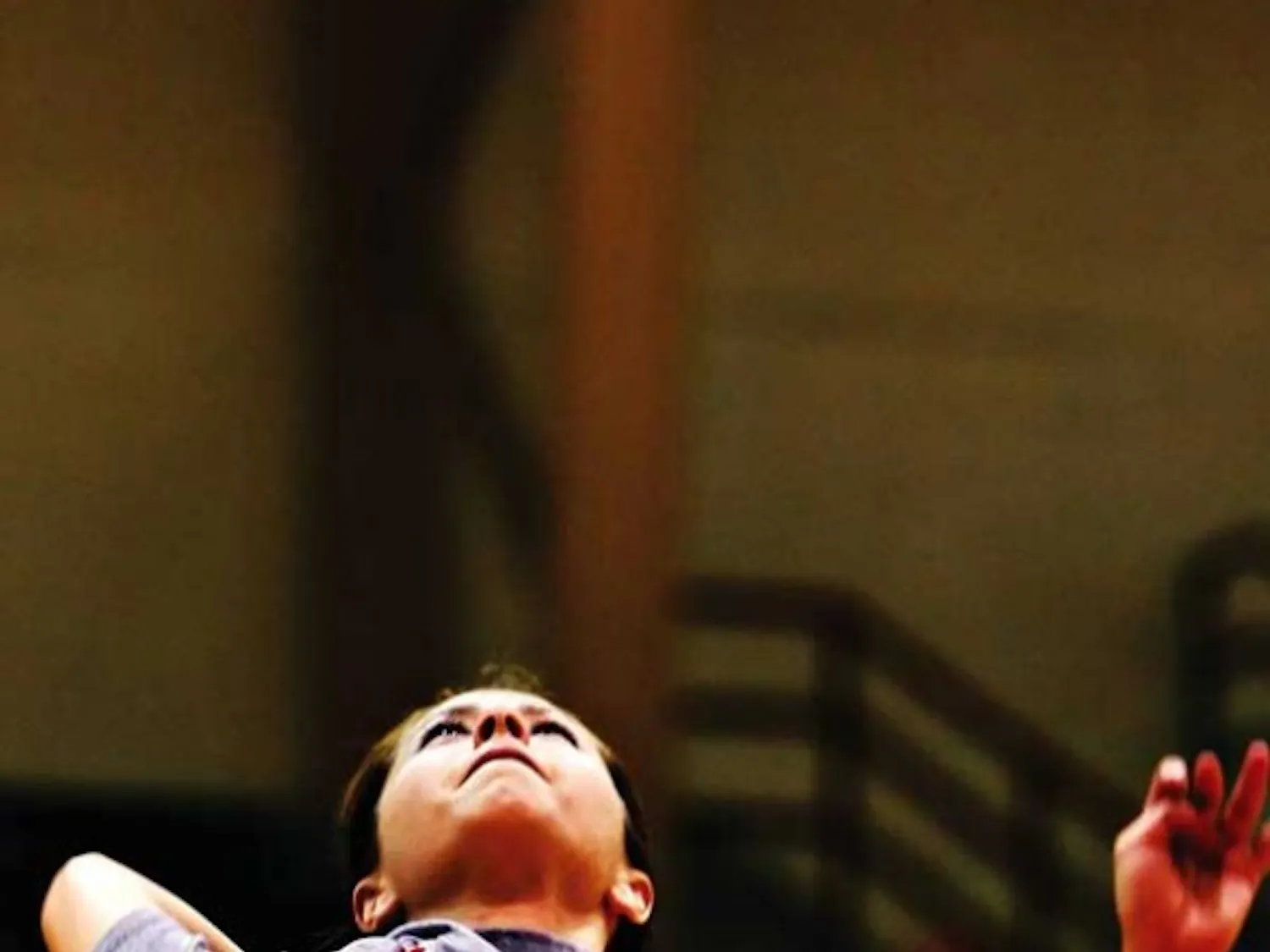 UNM's Gayle Tripp serves the ball during practice drills in Johnson Gym on Thursday.
