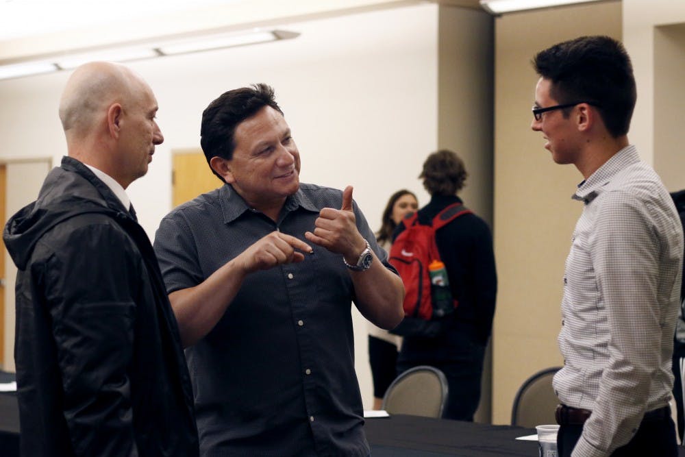 Frank Mirabal and Randy Asselin, two of the guess speakers in the CEO anagrol meeting speak with the creater after the meeting taking place in the SUB  3rd floor on Feb. 29, 2016. The club directs to students who are passionate about being enterpreneurs, abd their upcoming meeting will be March. 7, 2016.
