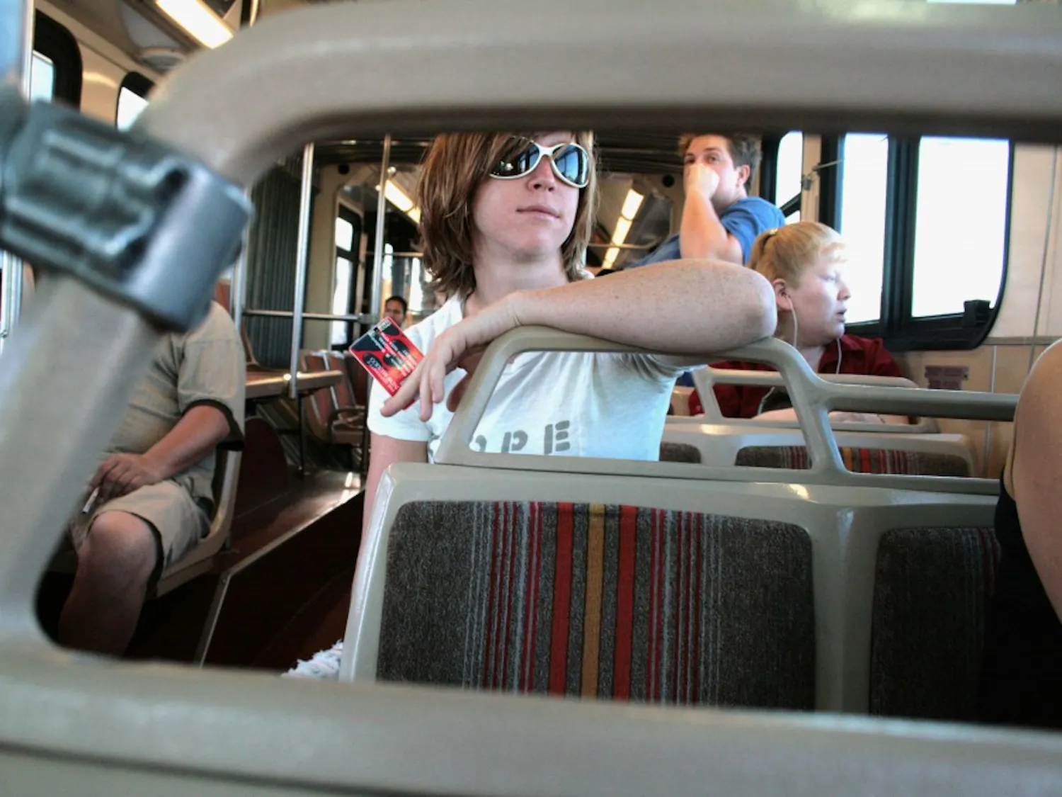 UNM Student Stephanie Botsford rides ABQ Ride between campus and home. The Rio Metro Regional Transit District now offers free bus passes on ABQ Ride and Rapid Ride for those who commute on the Rail Runner.