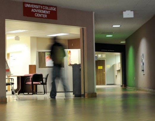 A student enters the Student Services Center as it opens Tuesday. Some of the center's offices will relocate about one mile south of UNM by the spring semester.  