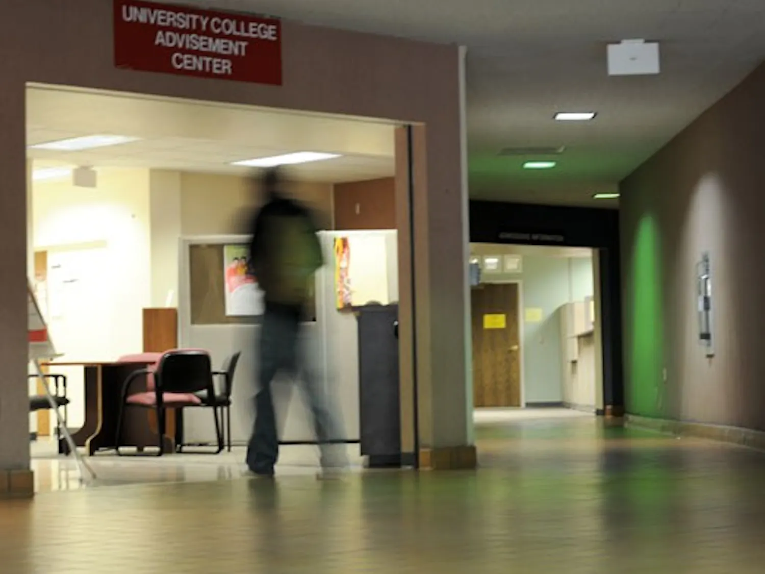 A student enters the Student Services Center as it opens Tuesday. Some of the center's offices will relocate about one mile south of UNM by the spring semester.