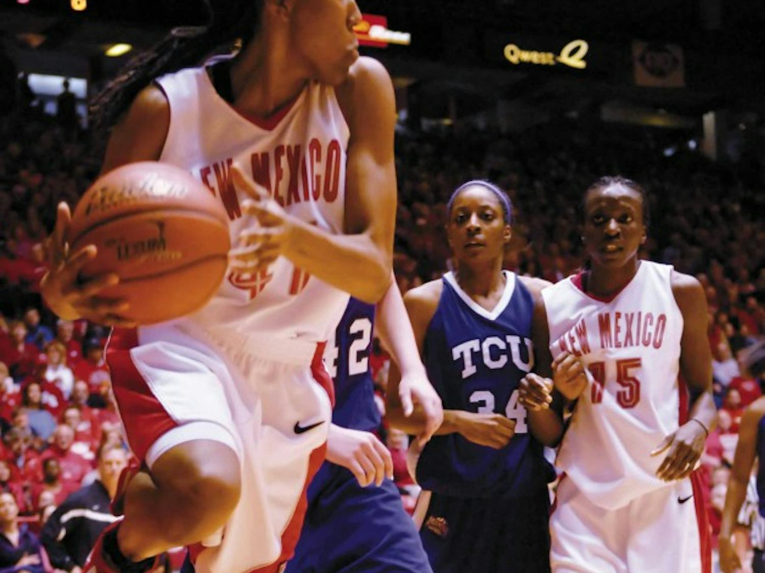 Junior guard Brandi Kimble passes the ball before going out of bounds during a 75-54 win over Texas Christian at The Pit on Sunday.