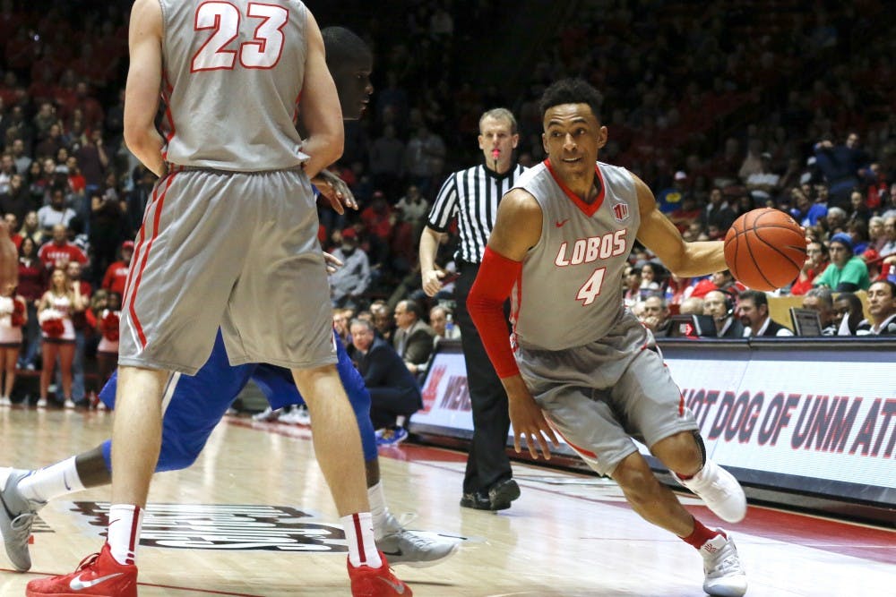 Redshirt sophomore guard Elijah Brown (4) charges around a Air Force player Wednesday, Jan. 28, 2016 at WisePies Arena. The Lobos...