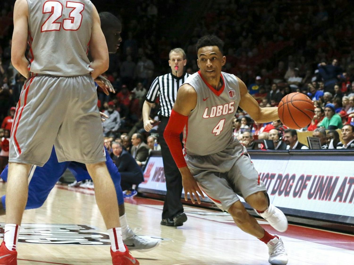 Redshirt sophomore guard Elijah Brown (4) charges around a Air Force player Wednesday, Jan. 28, 2016 at WisePies Arena. The Lobos...