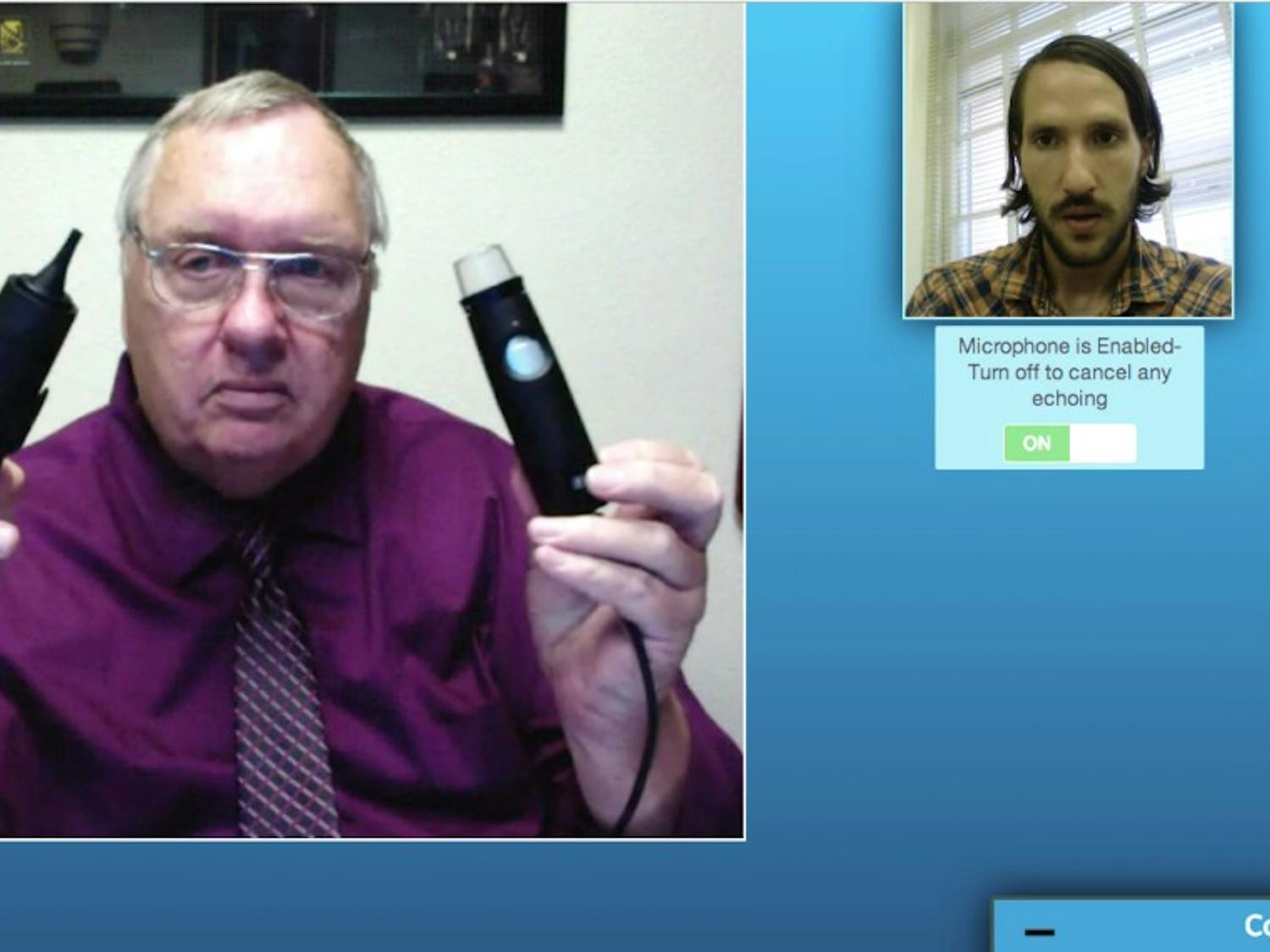 During a live demonstration Tuesday with the Daily Lobo, Net Medical Xpress CEO Dick Govatski, left, shows how his company’s Telemedicine Intensive Care Unit Carts operate. The system allows doctors to remotely diagnose patients, using this interface. This screenshot was captured by Jonathan Baca.