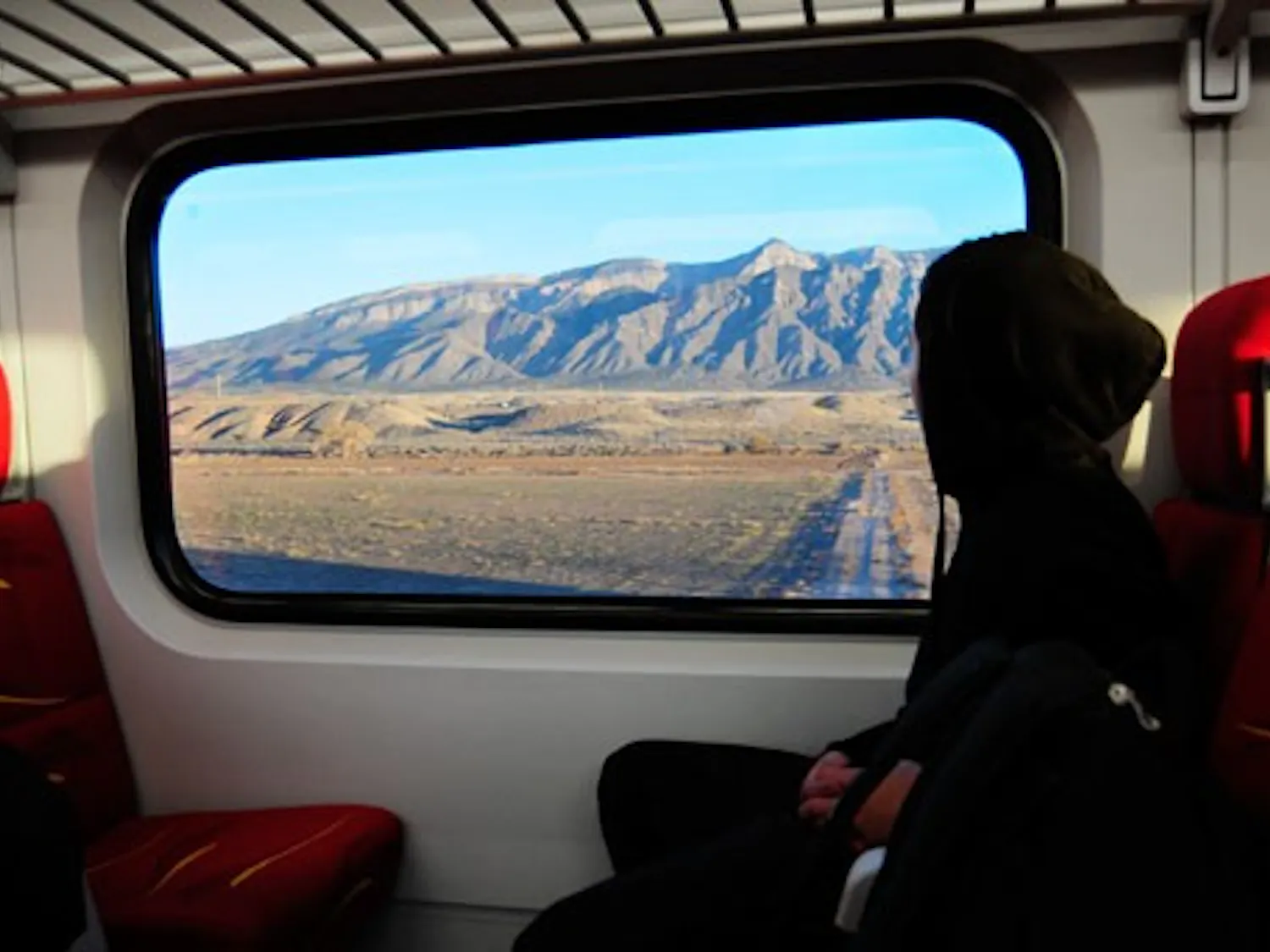 Michael Romero rides The Rail Runner to Bernalillo on Wednesday.