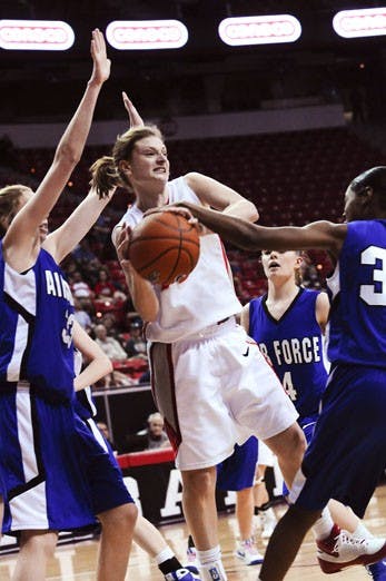 Amy Beggin scored 18 points, all in the first half, to push the Lobos over the Falcons on Tuesday at the Thomas and Mack Center. Beggin rested on the bench for most of the second half.