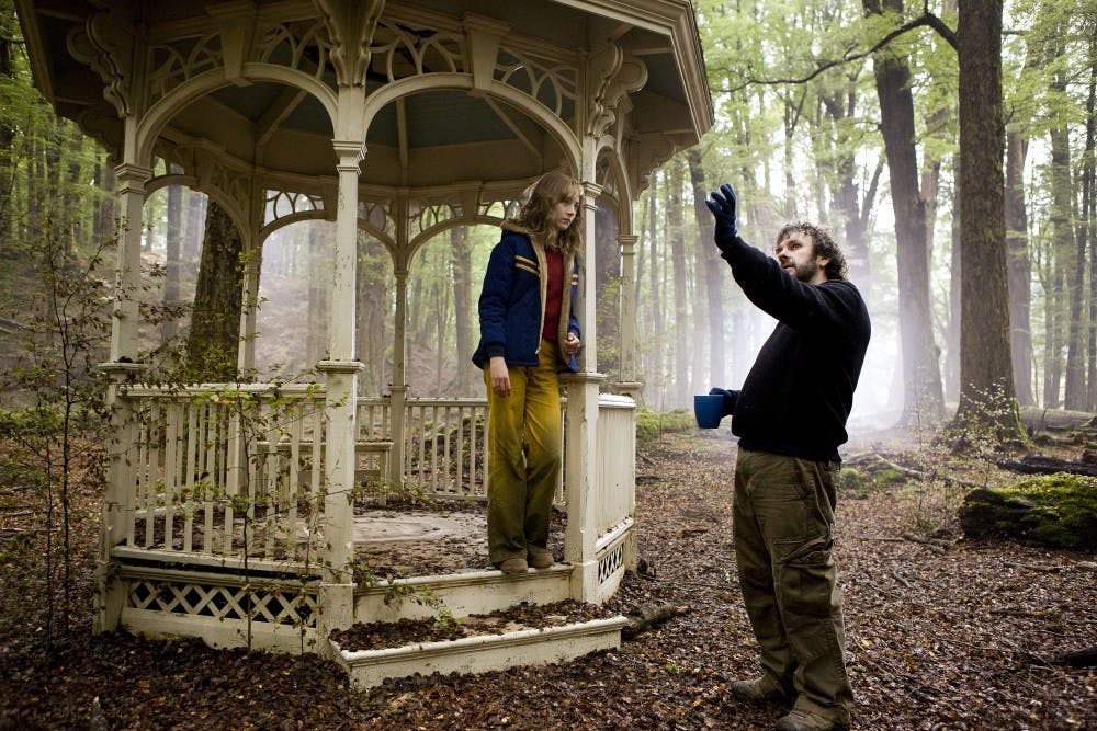 	Director Peter Jackson, right, and Saoirse Ronan during the filming of “The Lovely Bones.” Jackson outlined some challenges of adapting a novel to film in an interview with college newspapers in November.