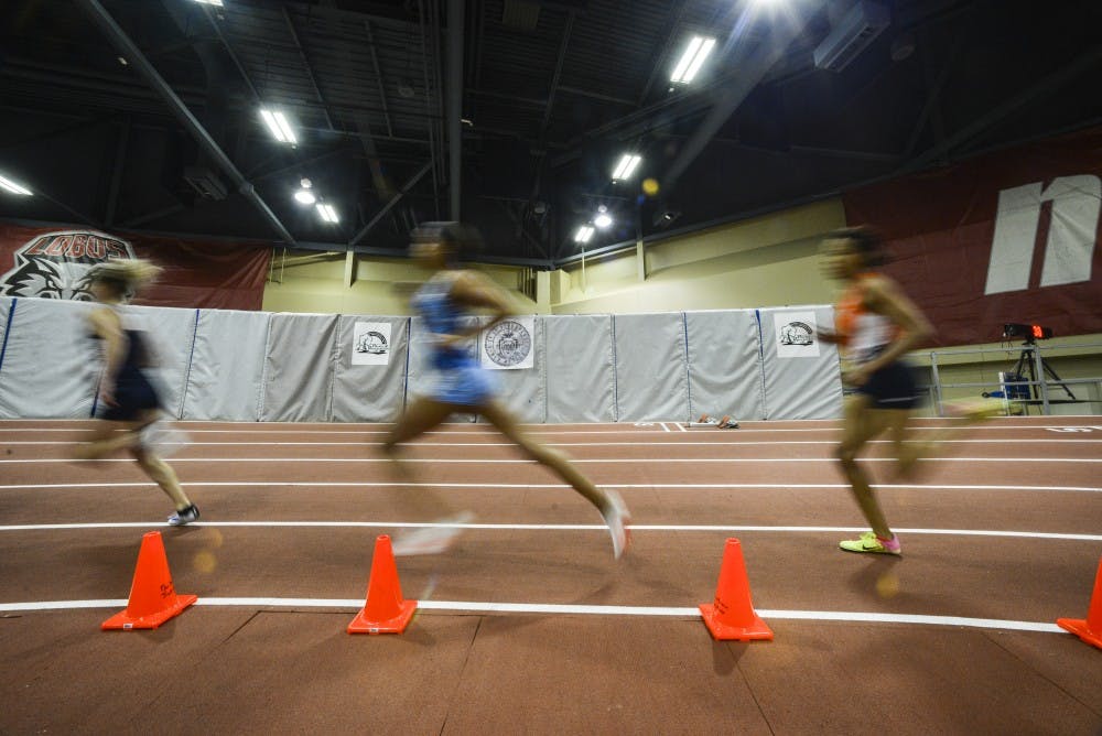 A pack of runners rounds the corner at the Albuquerque Convention Center on Saturday, Feb. 11, 2017 at the Don Kirby Invitational.