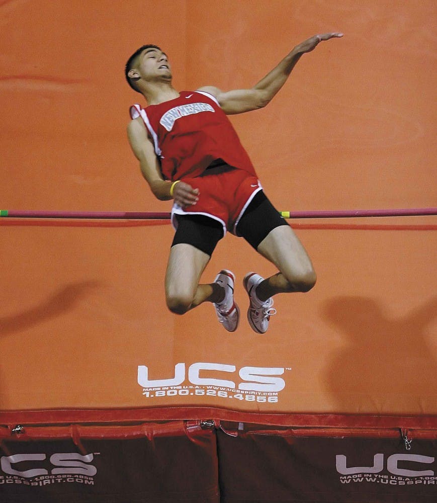 UNM high jumper Joshua Cosio jumps a height of 2.01 meters to finish 6th overall in the men's high jump at the Dan DeHart Invitational indoor track meet Saturday at the Albuquerque Convention Center.