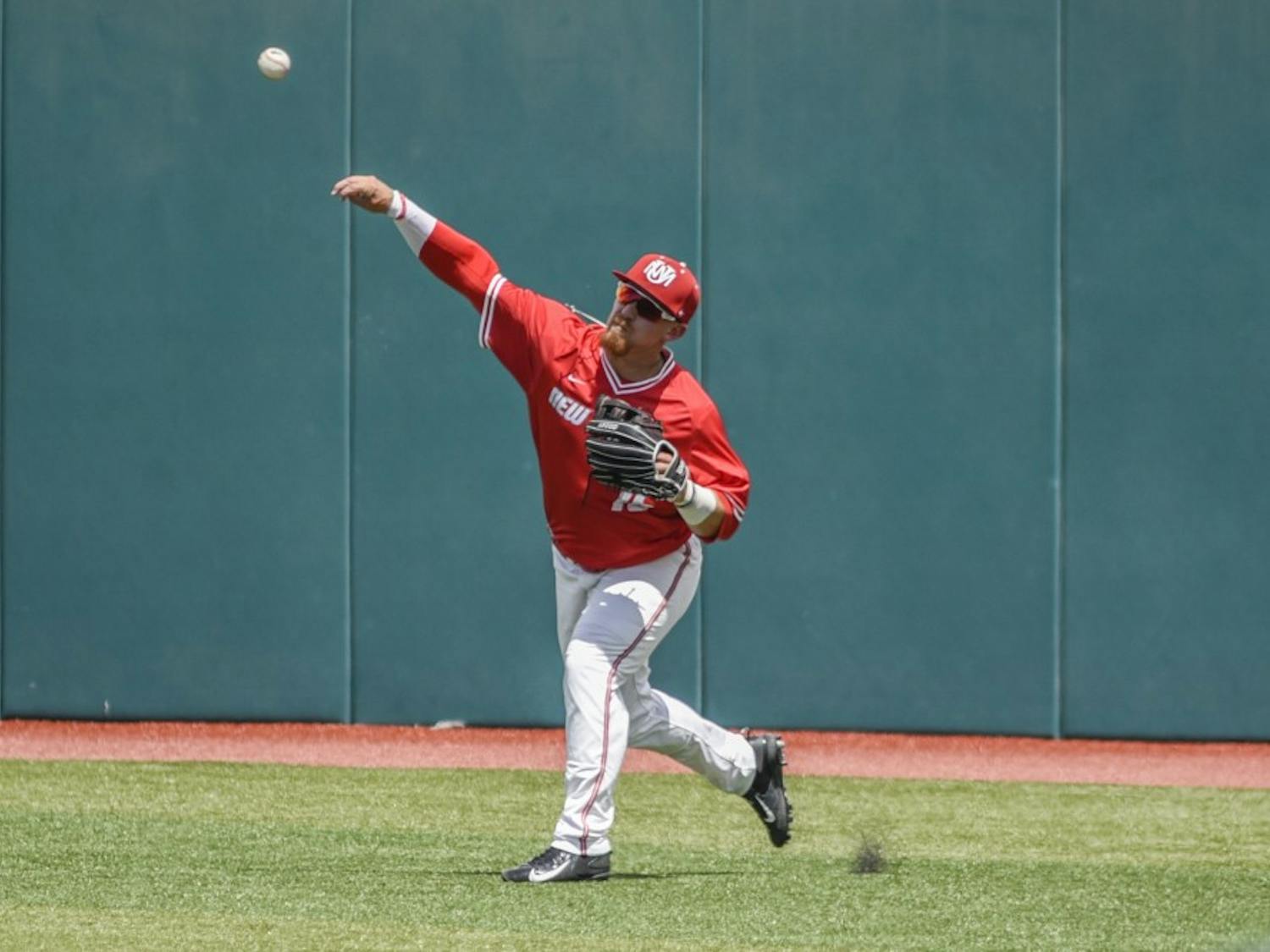 Sophomore Jared Mang launches the ball from the outfield during the Lobos game against Air Force Saturday, May 6, 2017 at Santa Ana Star Field.&nbsp;