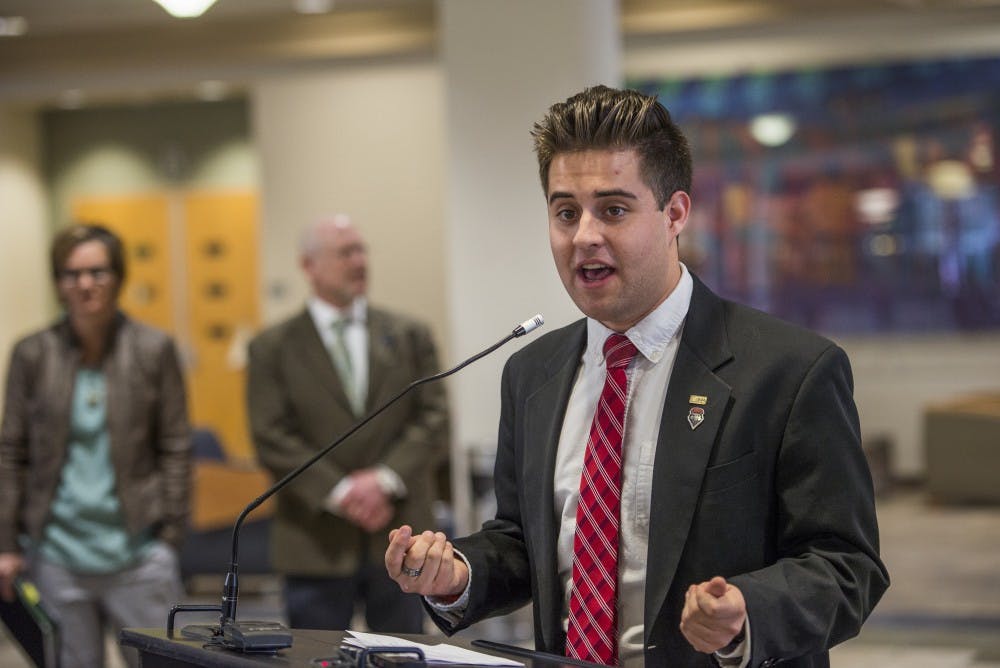 Former ASUNM President Kyle Biederwolf address a crowd about a student government initiative that partners with Albuquerque Heading Home on Thursday, Jan. 19, 2017. Biederwolf has served as the ASUNM President for the 2016-2017 academic year.