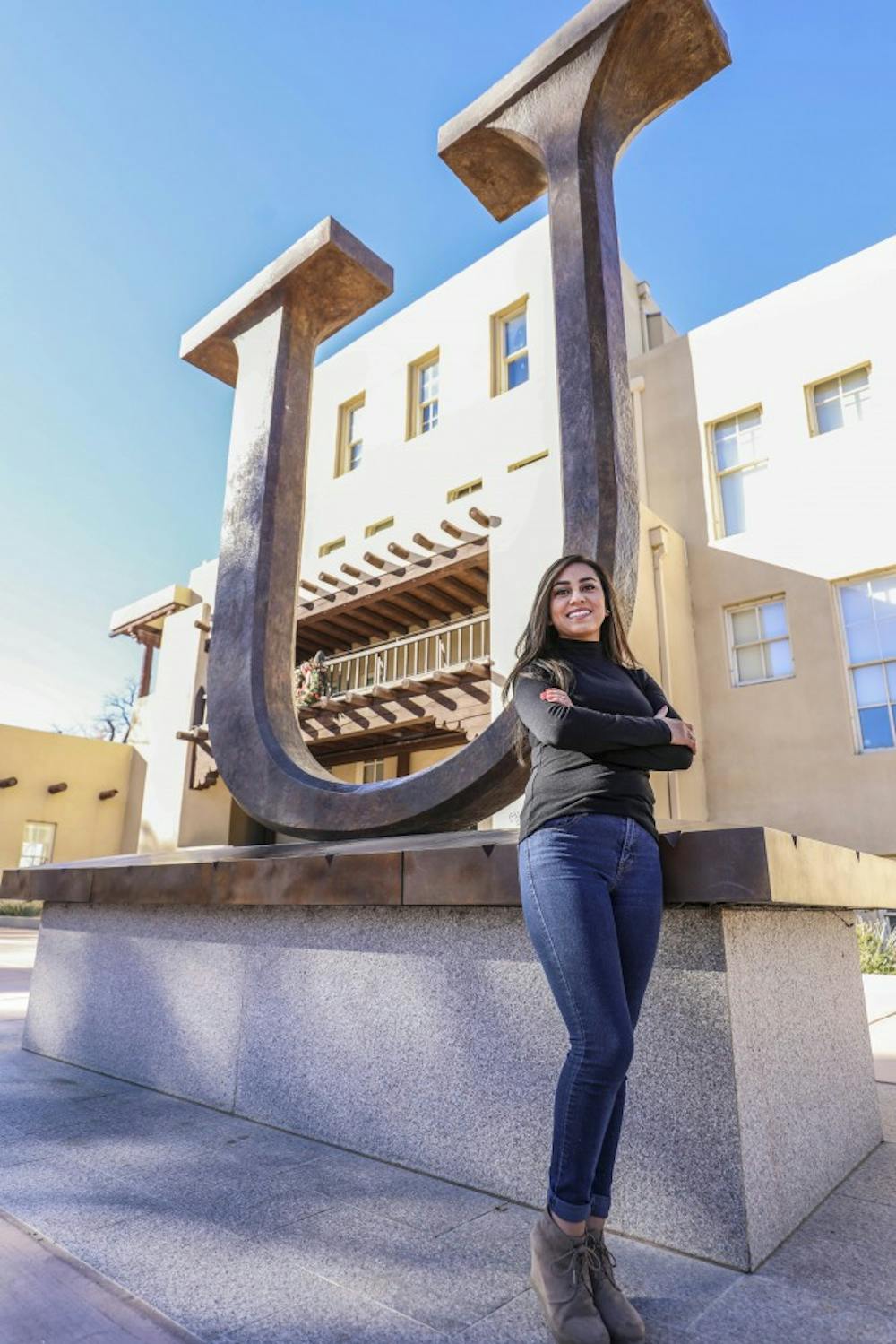 Julieann Lopez stands near Hodgin Hall. She will be receiving her Bachelor of Science in exercise science and a minor in psychology.

