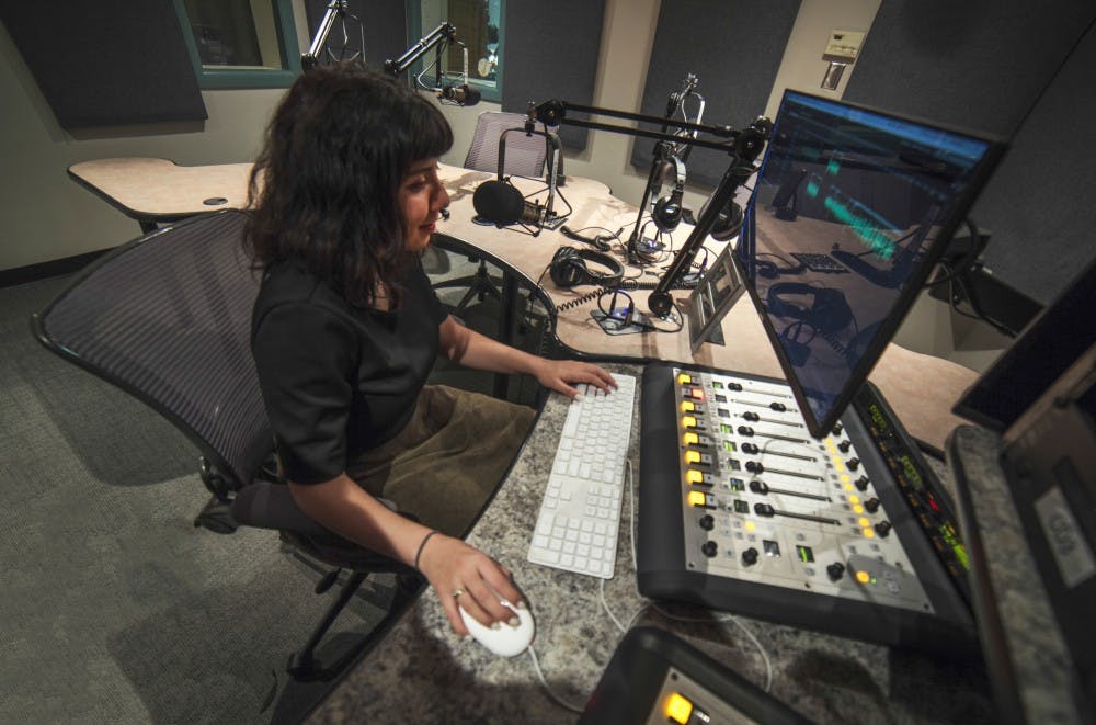 Christina Rodriguez, a Generation Justice fellow &mdash; KUNM's community journalism media project &mdash; edits audio in a KUNM studio. Rodriguez says that public broadcasting is one of the only ways that communities can have agency over their own stories.