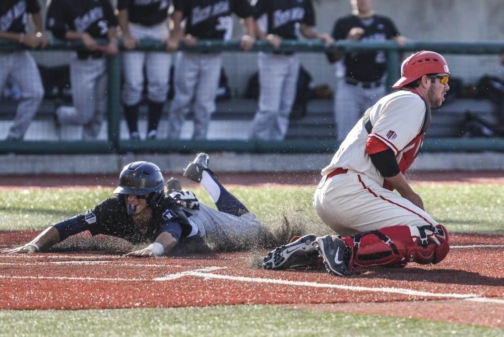 Freshman catcher Andrew Pratt attempts to out a Nevada player during the 2016 Mountain West Championship Saturday May 28, 2016 at Santa Ana Star Field. Pratt is an Albuquerque, New Mexico native who was drafted by the Lobo after graduating from La Cueva High School.&nbsp;