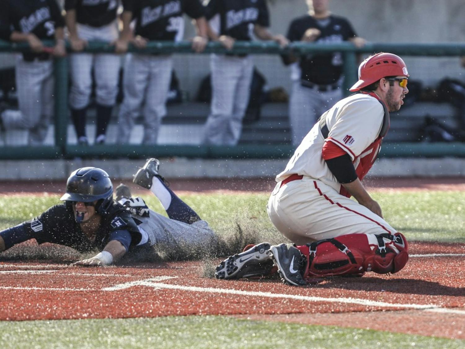Freshman catcher Andrew Pratt attempts to out a Nevada player during the 2016 Mountain West Championship Saturday May 28, 2016 at Santa Ana Star Field. Pratt is an Albuquerque, New Mexico native who was drafted by the Lobo after graduating from La Cueva High School. 
