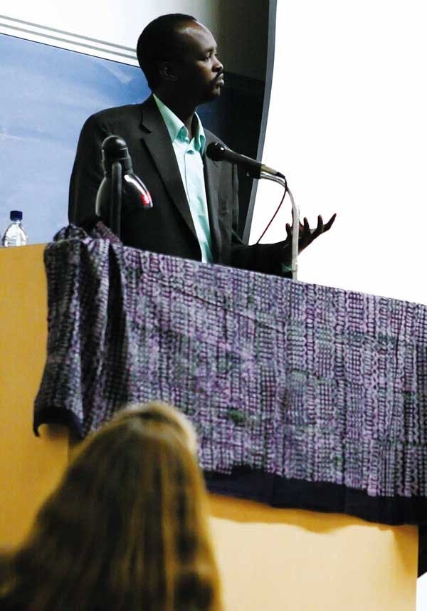 Daoud Hari, a Darfur refugee, talks about his experiences in the war-torn region during a presentation in the anthropology building Saturday. He and two other Darfur refugees are touring the U.S. to raise awareness about the genocide in their country.