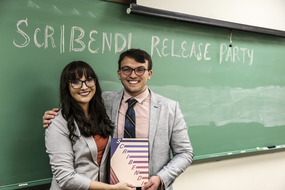 2018 Editor-in-Chief, Josh Rysanek stands next to 2019 Editor-in-Chief, Alyssa Aragon during the Scribendi release party on April 28, 2018.