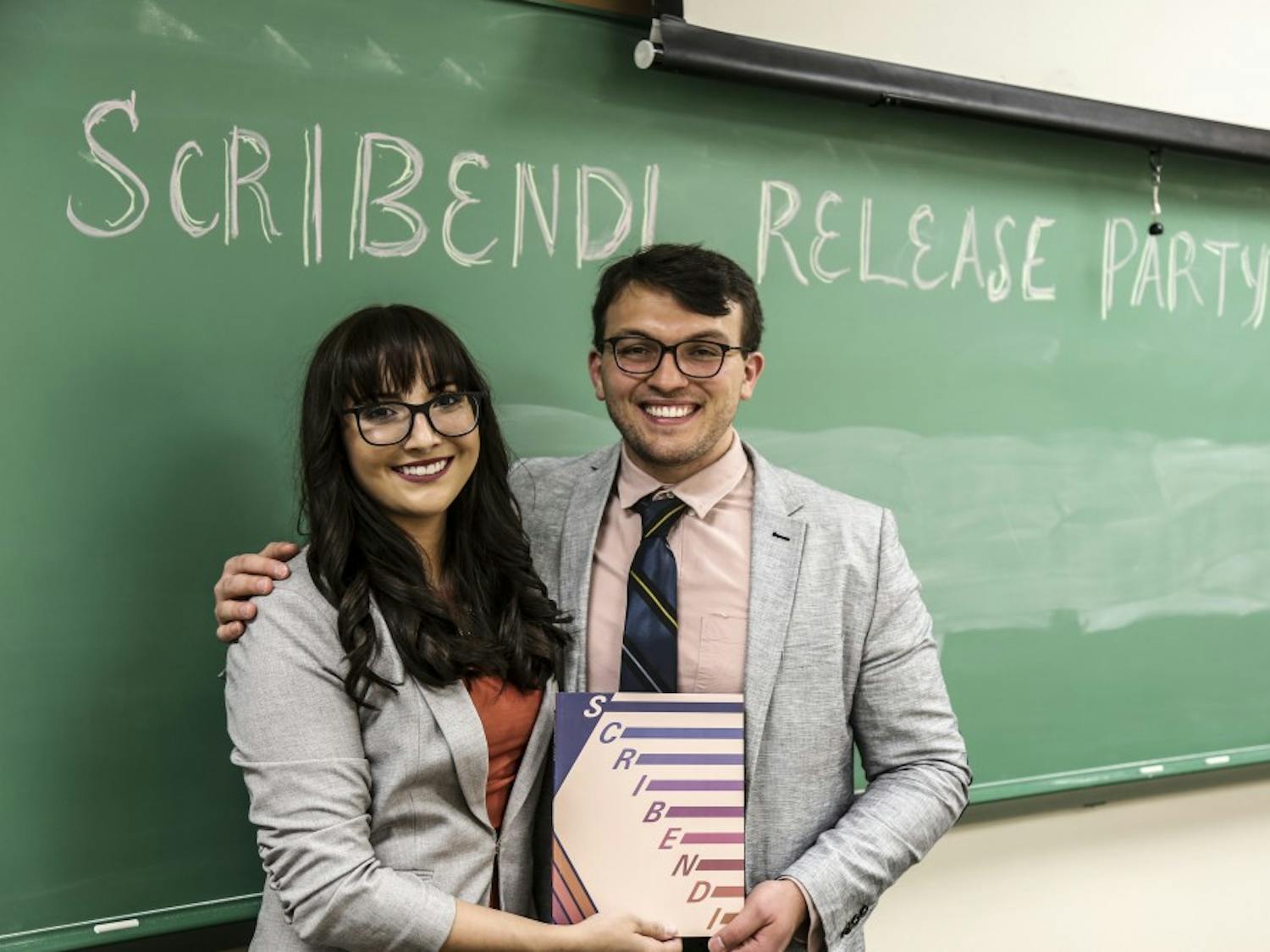 2018 Editor-in-Chief, Josh Rysanek stands next to 2019 Editor-in-Chief, Alyssa Aragon during the Scribendi release party on April 28, 2018.