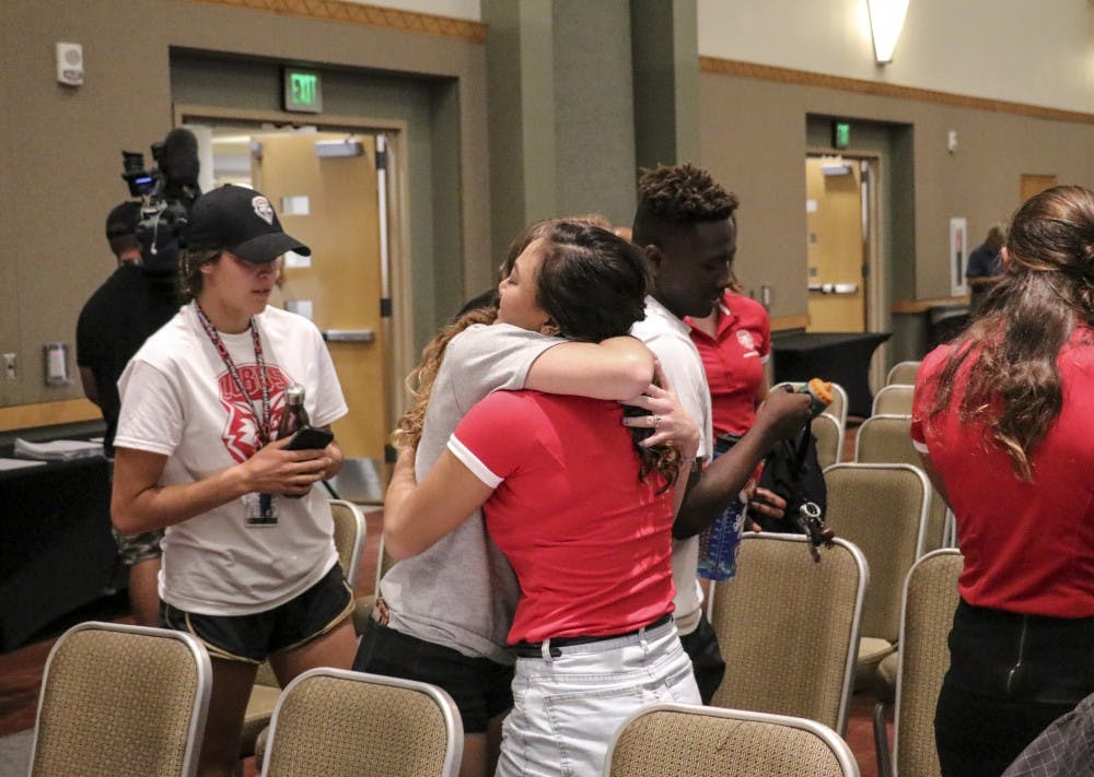 Members of the UNM Diving team celebrate after discovering their sport had been reinstated during the special BOR meeting on Aug. 17, 2018.&nbsp;
