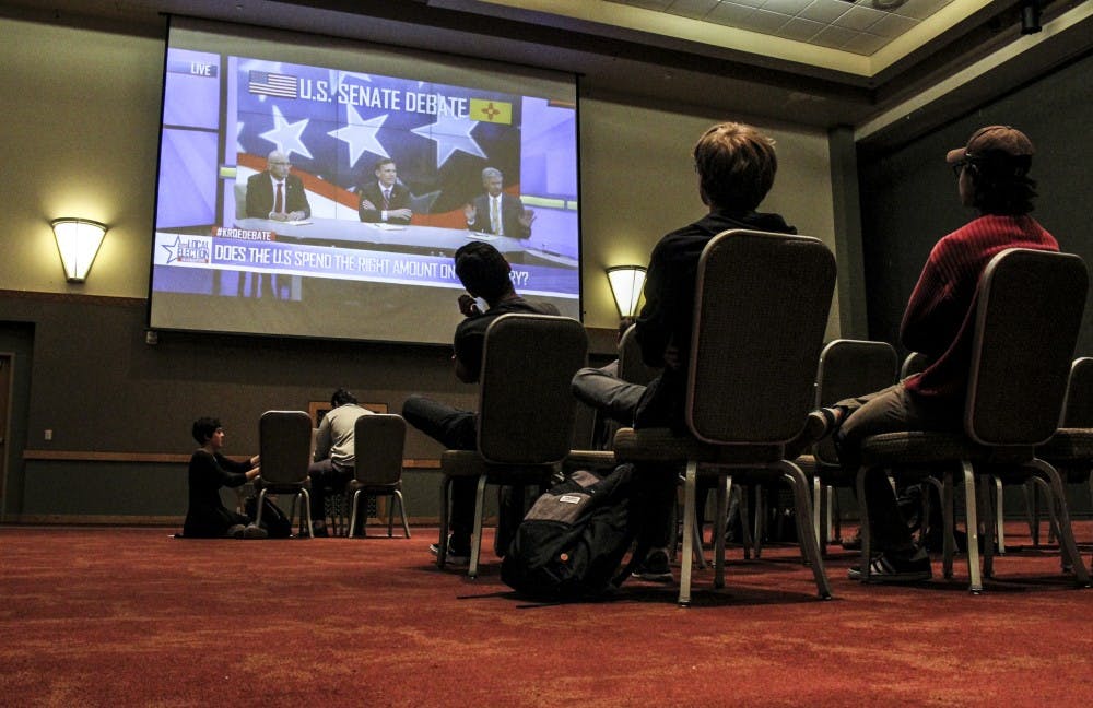 UNM students watching US Senate Debate in SUB Ballroom