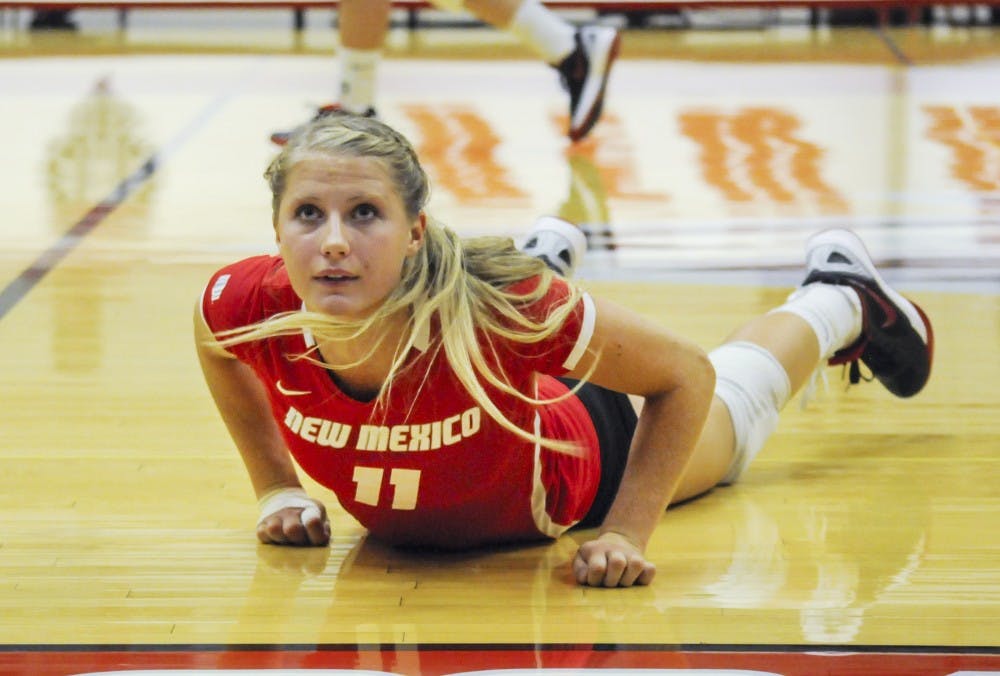 	Lobo sophomore setter Lise Rugland watches the ball go into the audience during the Lobo Alumnae Volleyball exhibition at Johnson Gym on Saturday night. The current Lobos defeated the Alumnae team 3-1.