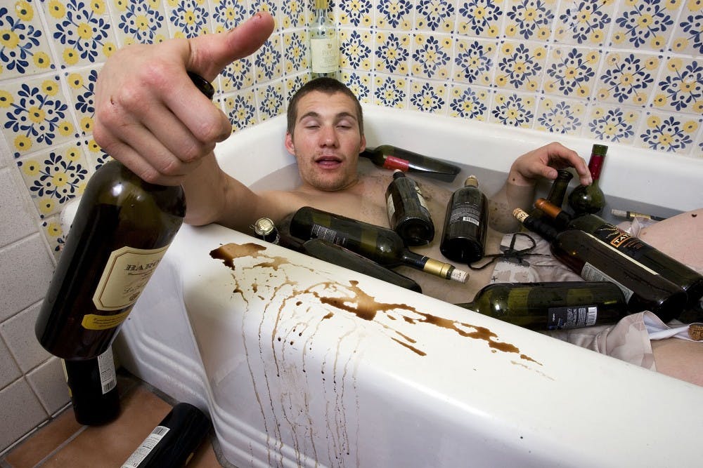	Student Ryan Garcia takes a study break four days into the implementation of UNM’s wet campus policy. “Leave me alone, mom!” he screamed at our photographer.