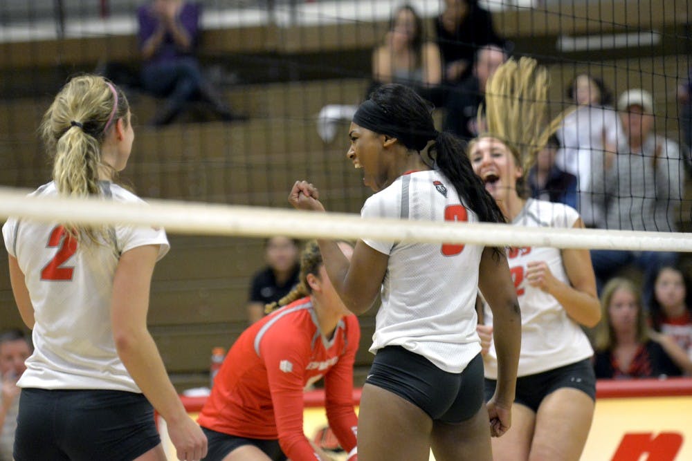 Senior middle blocker Simone Henderson celebrates at Johnson Center Oct. 29. The Lobos beat Fresno State this Saturday 3-0 and play Utah State this Wednesday at&nbsp;7 p.m..