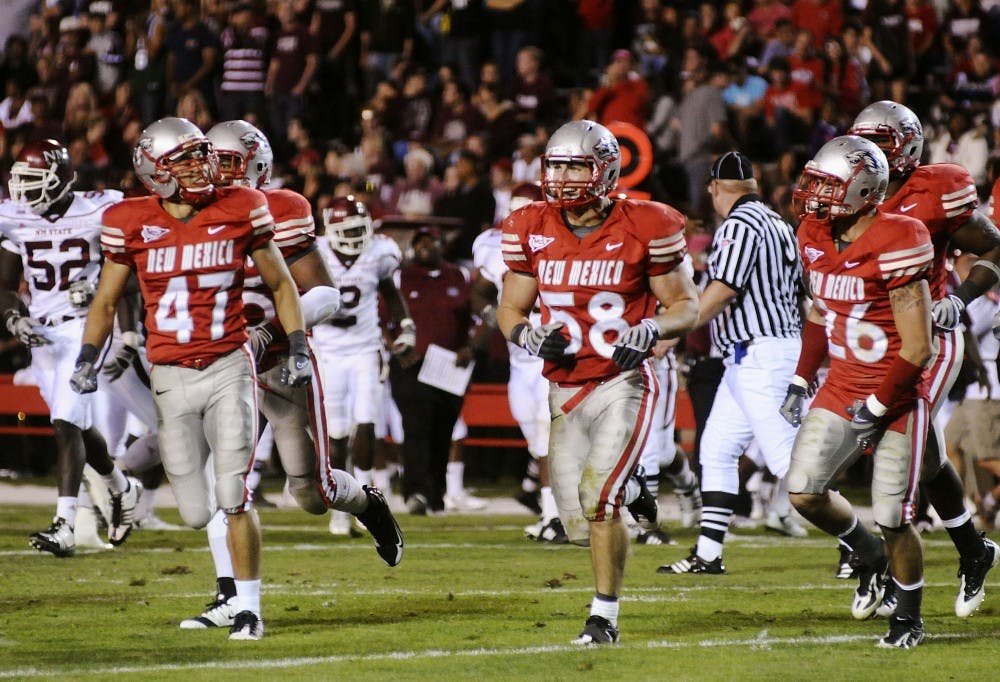 	Linebacker Carmen Messina celebrates after catching an interception during Saturday’s game against NMSU. Messina leads the nation in tackles. The Lobos will face Texas Tech in Lubbock, Texas, on Saturday.