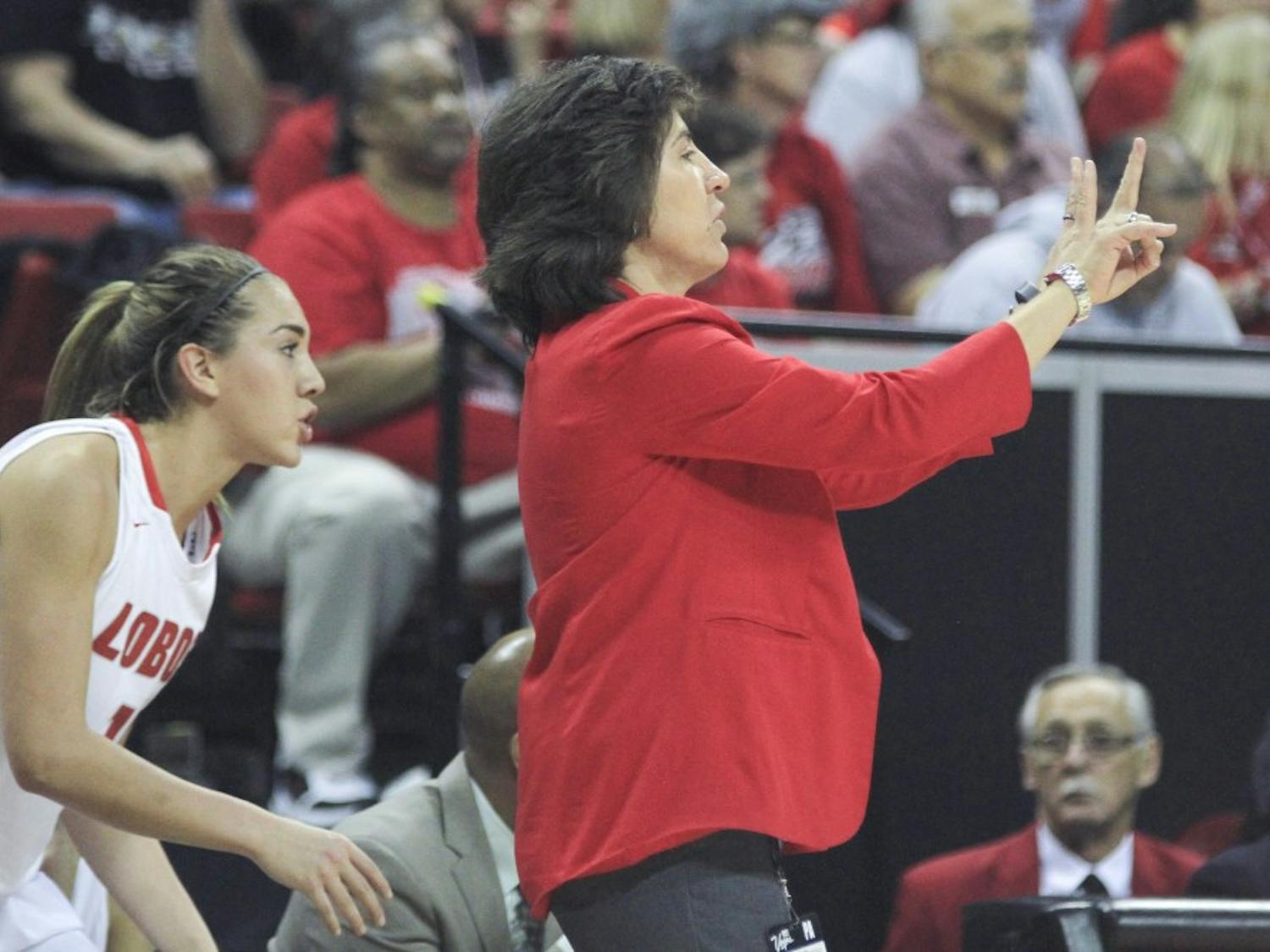 New Mexico head coach Yvonne Sanchez calls a play for her team late in the first half as Alexa Chavez checks into the game during the Mountain West Basketball Championship game Friday afternoon at the Thomas & Mack Center in Las Vegas, Nevada.