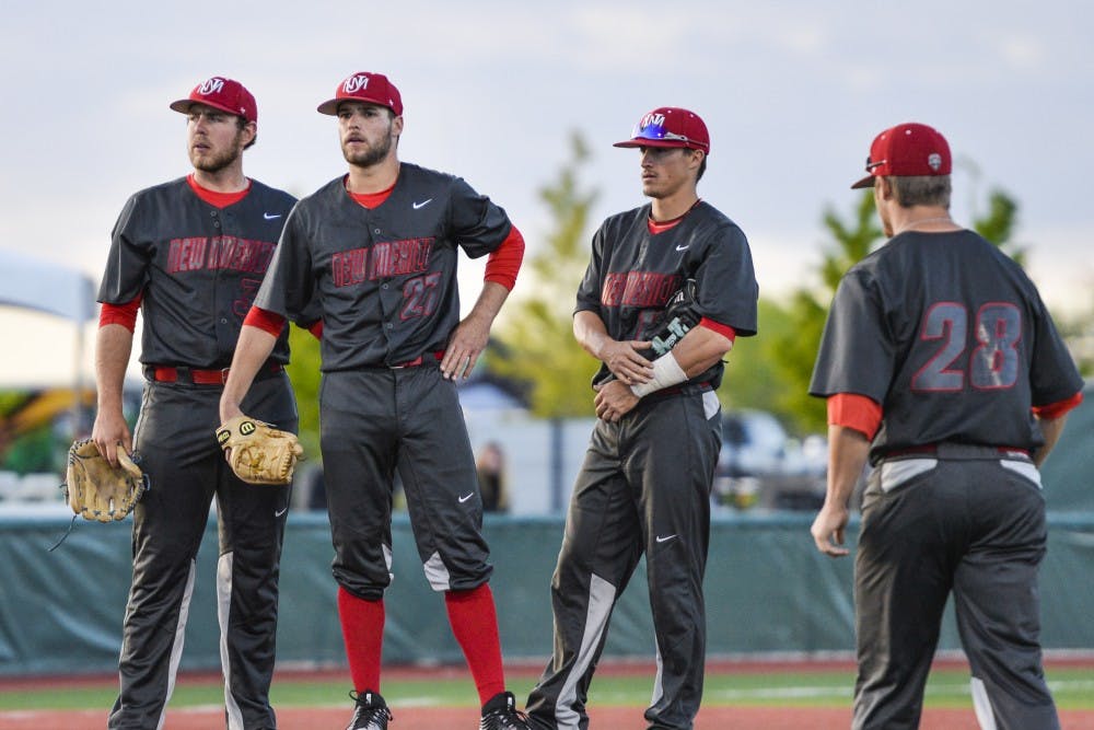 The Lobos meet on the mound during a stop in play while facing off with Texas Tech Tuesday, April. 19, 2016.&nbsp;The Mountain West released a preseason pick that UNM will be the 2017 season champs.&nbsp;