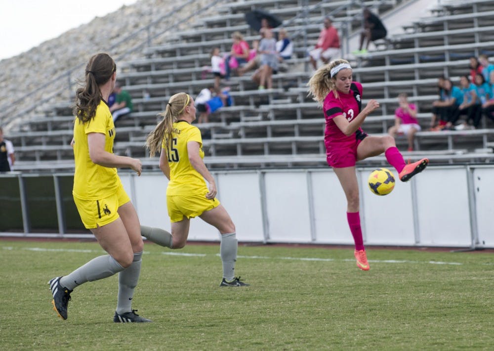 UNM midfielder Alyssa Coonrod defends the ball against Wyoming on October 26, 2014. Despite a new coaching staff UNMs soccer team hosts experienced returning players. 