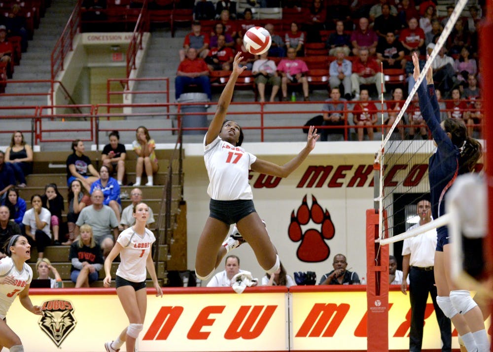 Skye Gullatt leaps into the air to send the ball towards Fresno Oct. 15, 2015 at Johnson Center. The Lobos swept Fresno State with a 3-0 win and play UNLV Saturday night at 7 p.m..