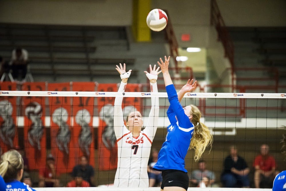 Victoria Spragg prepares to block the ball against Air Force on 