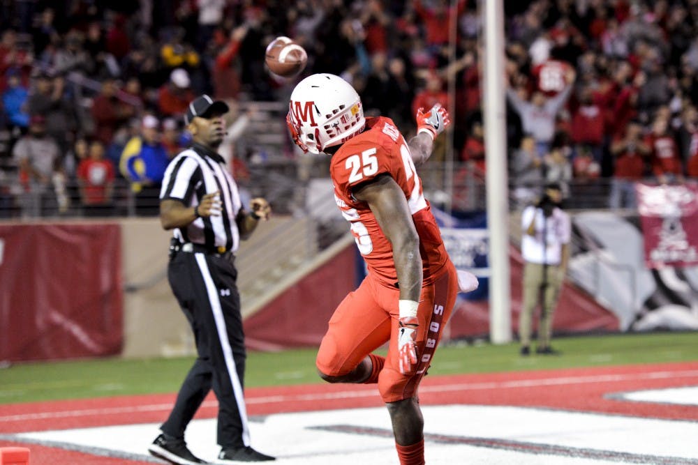 Redshirt sophomore Tyrone Owens returns the ball to the referee after running in a touchdown against Boise State on Friday, Oct. 7, 2016 at University Stadium. The Lobos upset the Air Force Falcons on Saturday night with a 45-40 victory.