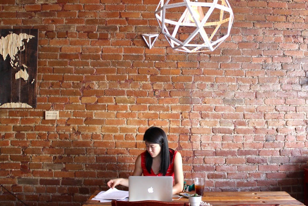 Jane Yoon a resident at UNM hospital studies at Deep Space Coffee Saturday afternoon. Deep Space Coffee is a popular place for UNM students to study.