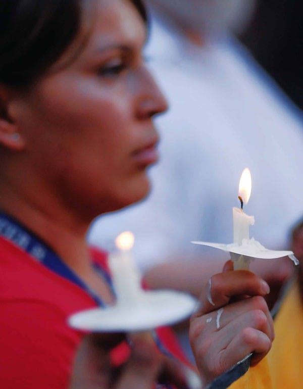 Tomasita Gonzalez attends an immigrant rights vigil outside the Bernalillo Metropolitan Detention Center on June 19. About 30 people attended the vigil hosted by El Centro de Igualdad y Derechos.