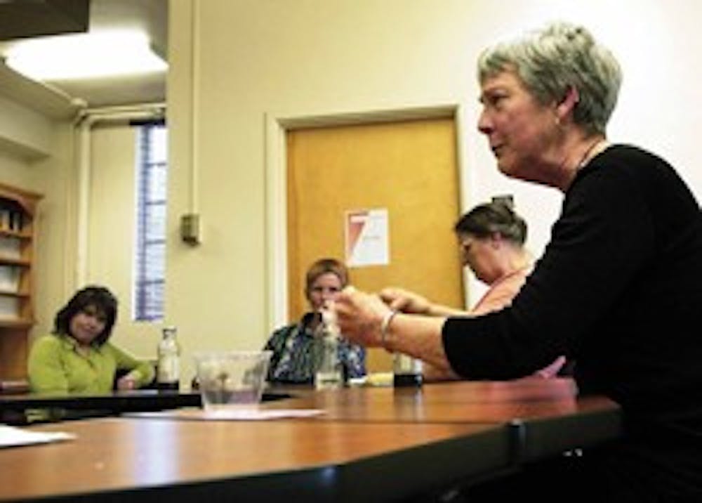 Sonia Johnson, right, talks about a time as a child when she physically defended herself against her brother.