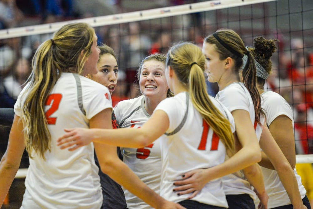 The Lobos huddle together and celebrate a kill against San Jose State Saturday, Oct. 29, 2016 at Johnson Center Gym. The lobos swept San Jose State 3-0.&nbsp;