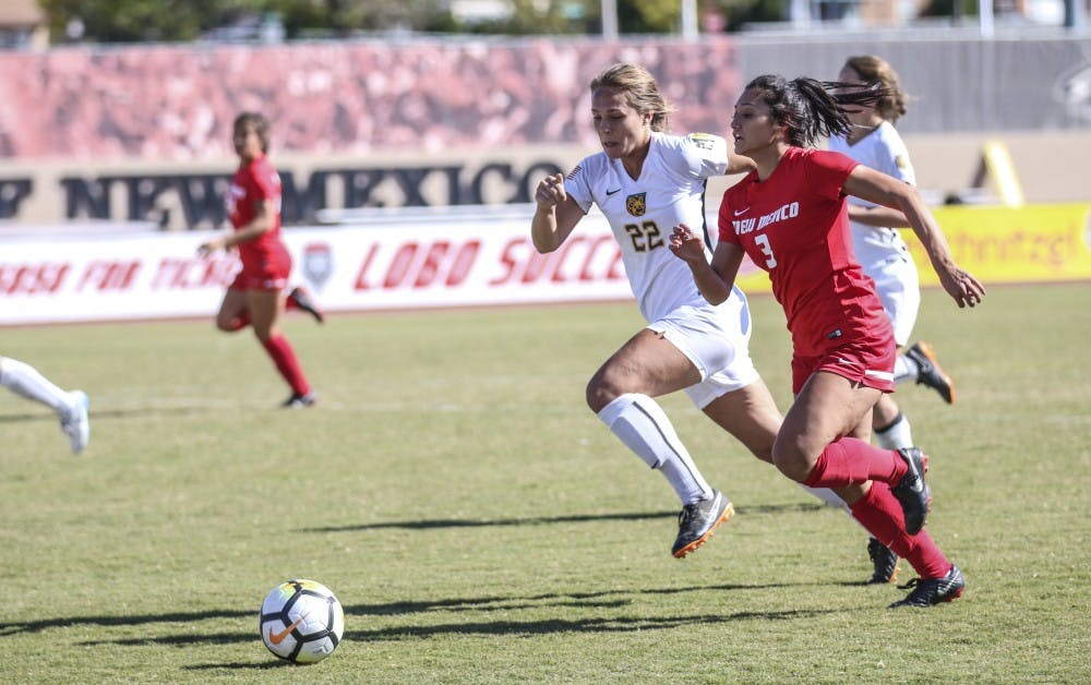 Leilani Baker races to the ball against Colorado College player, UNM won 2-1
