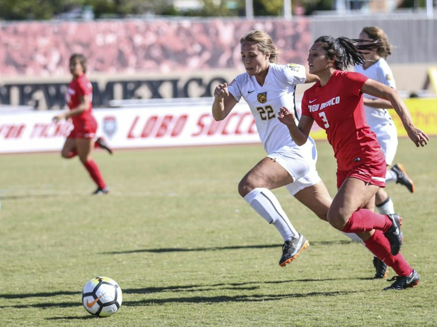 Leilani Baker races to the ball against Colorado College player, UNM won 2-1