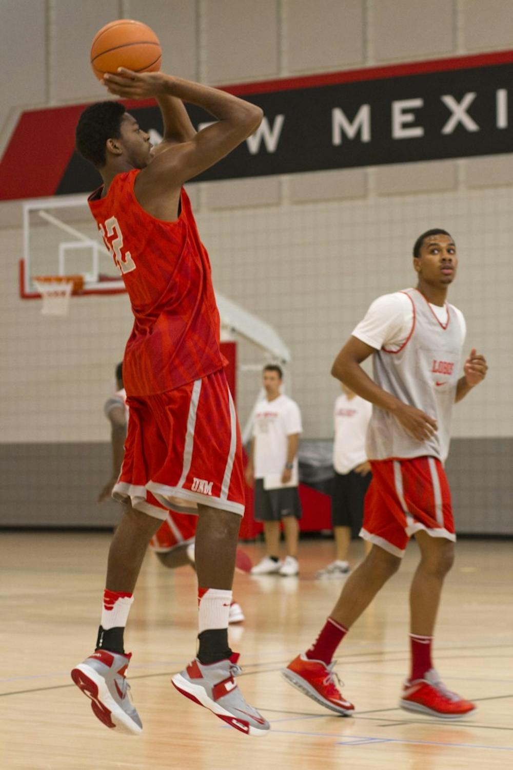 	Forward guard Devon Williams sets for a shot as Sophomore Aurthur Edwards looks on Thursday during open practice at the Rudy Davalos Basketball Center practice court. The Lobos left Albuquerque Friday for a three-game exhibition tour in Australia
