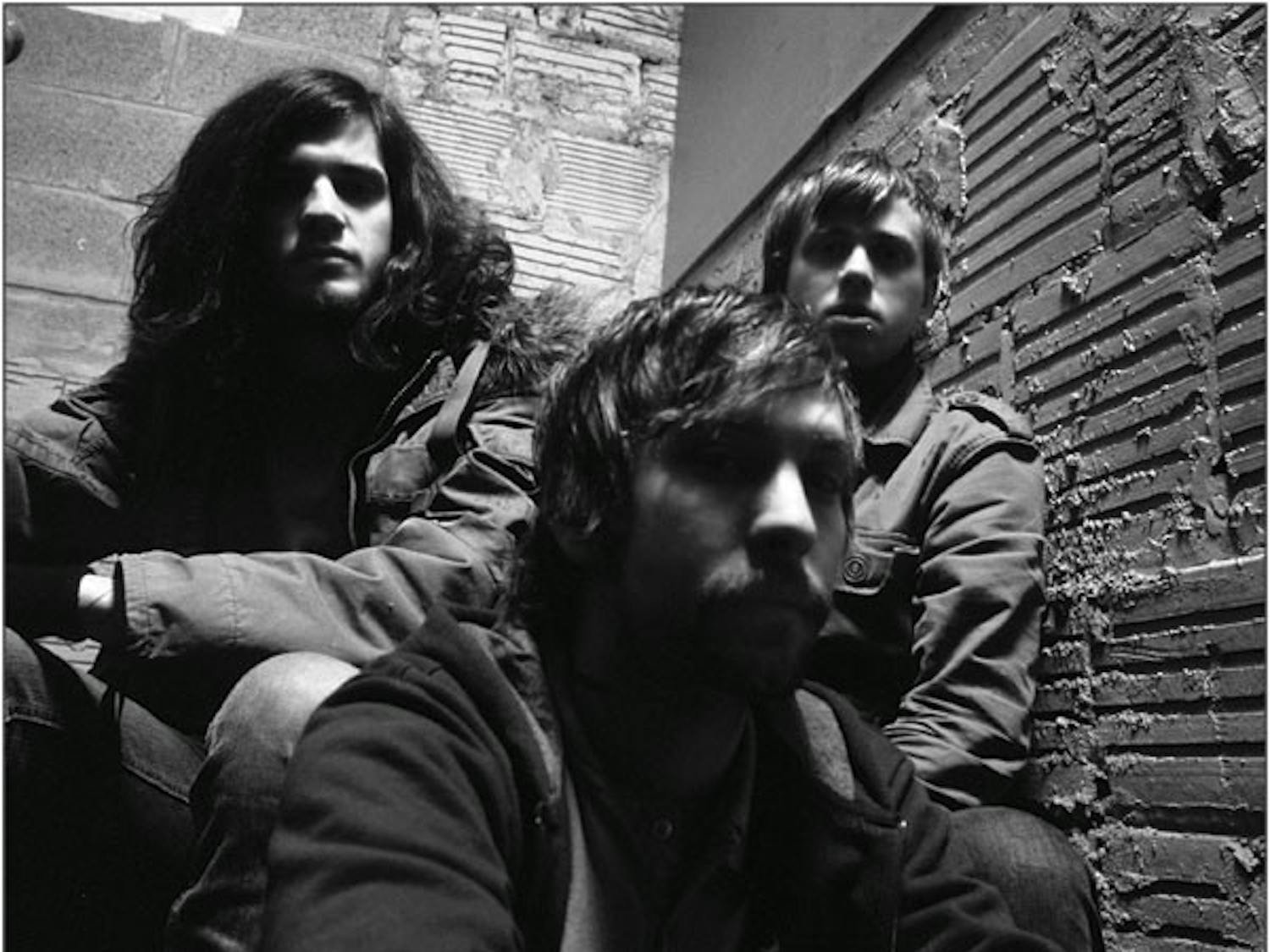 Fall of Troy is, from left, Thomas Erak, guitarist and lead singer; Andrew Forsman, drummer; and Tim Ward, bassist.