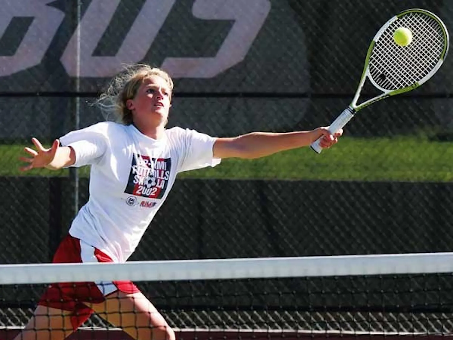 UNM's Victoria Tessmar returns a volley during practice Tuesday at the UNM Tennis Complex.