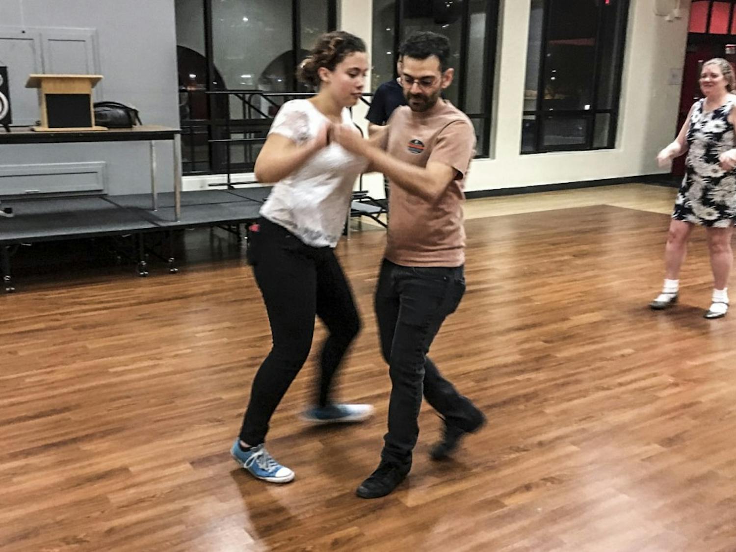 People swing dance at the Cellar in Hokona Hall.Photo courtesy of Aubrie Powell