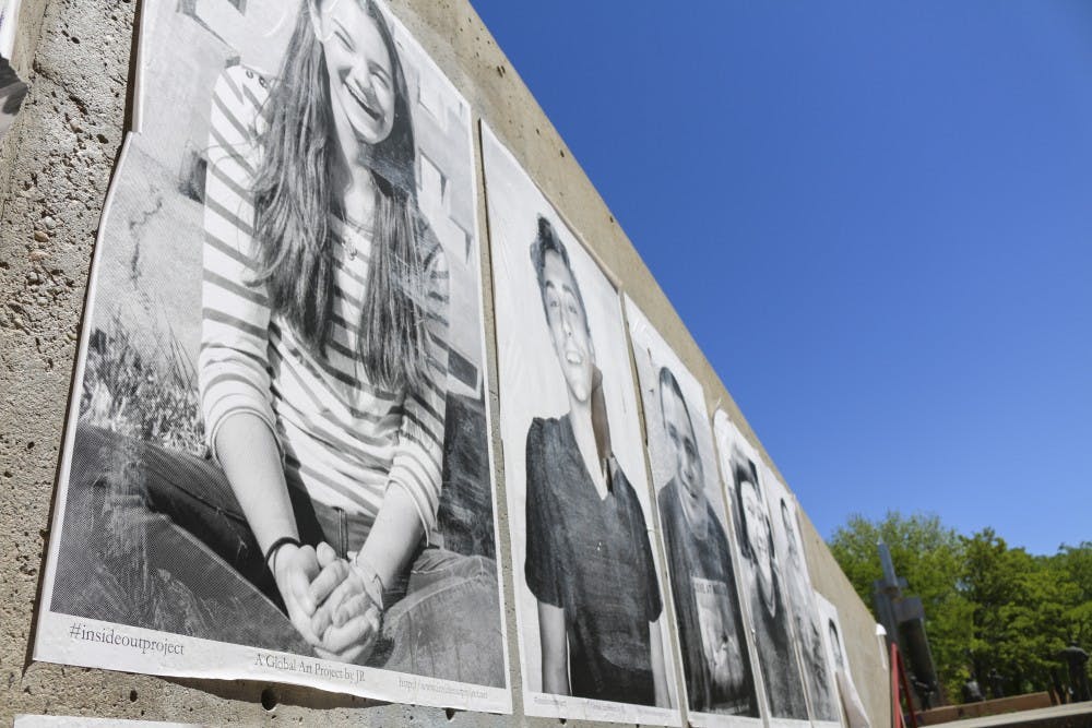 Photographs of the Inside Out project line the south wall of the SUB. The artwork was created by international artist JR. The project aims to bring awareness to various types of disabilities.