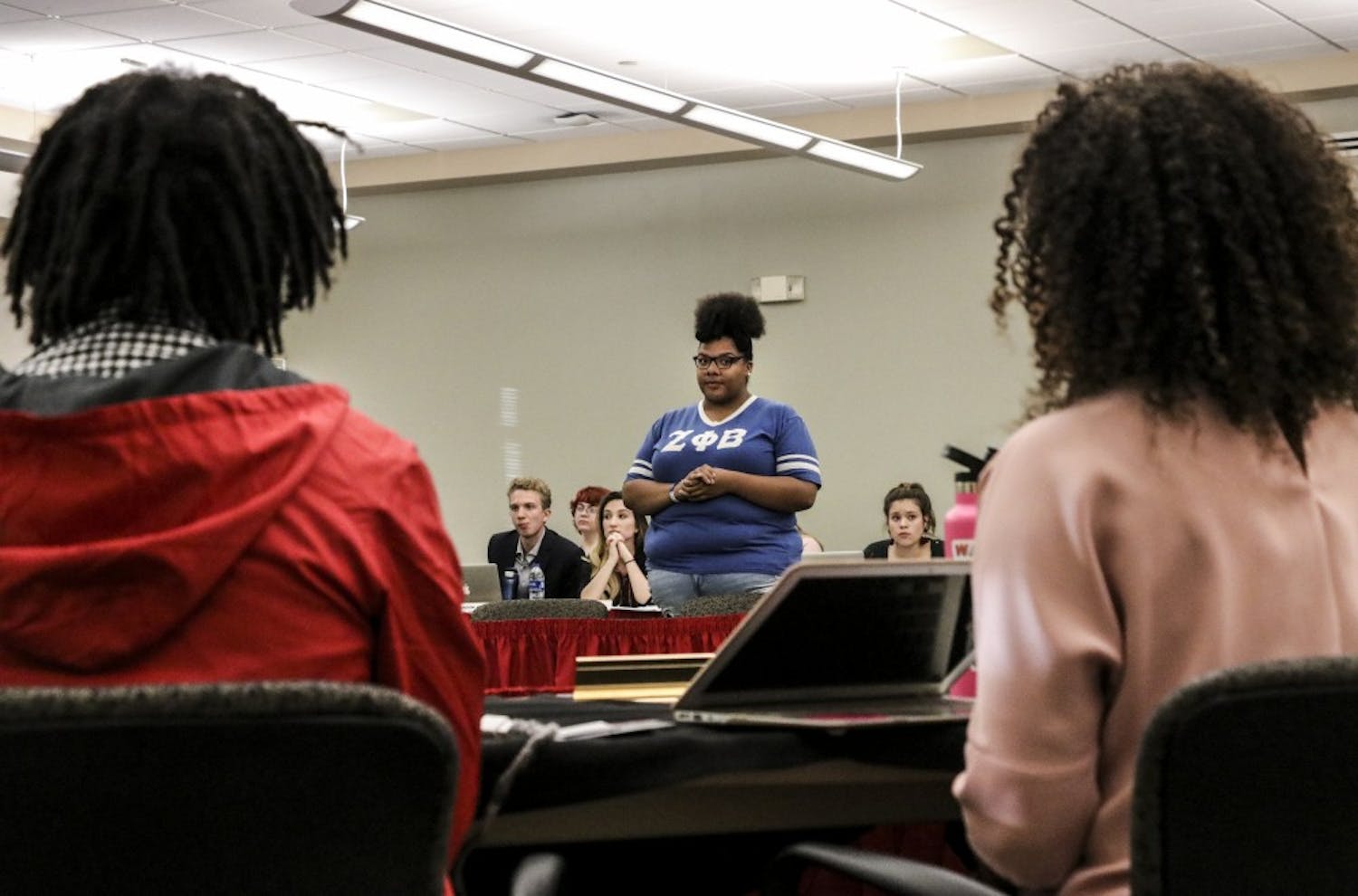 Dannelle Kirven talks to the ASUNM Senate Wednesday night about recent racialized comments made by members of Kappa Kappa Gamma.
