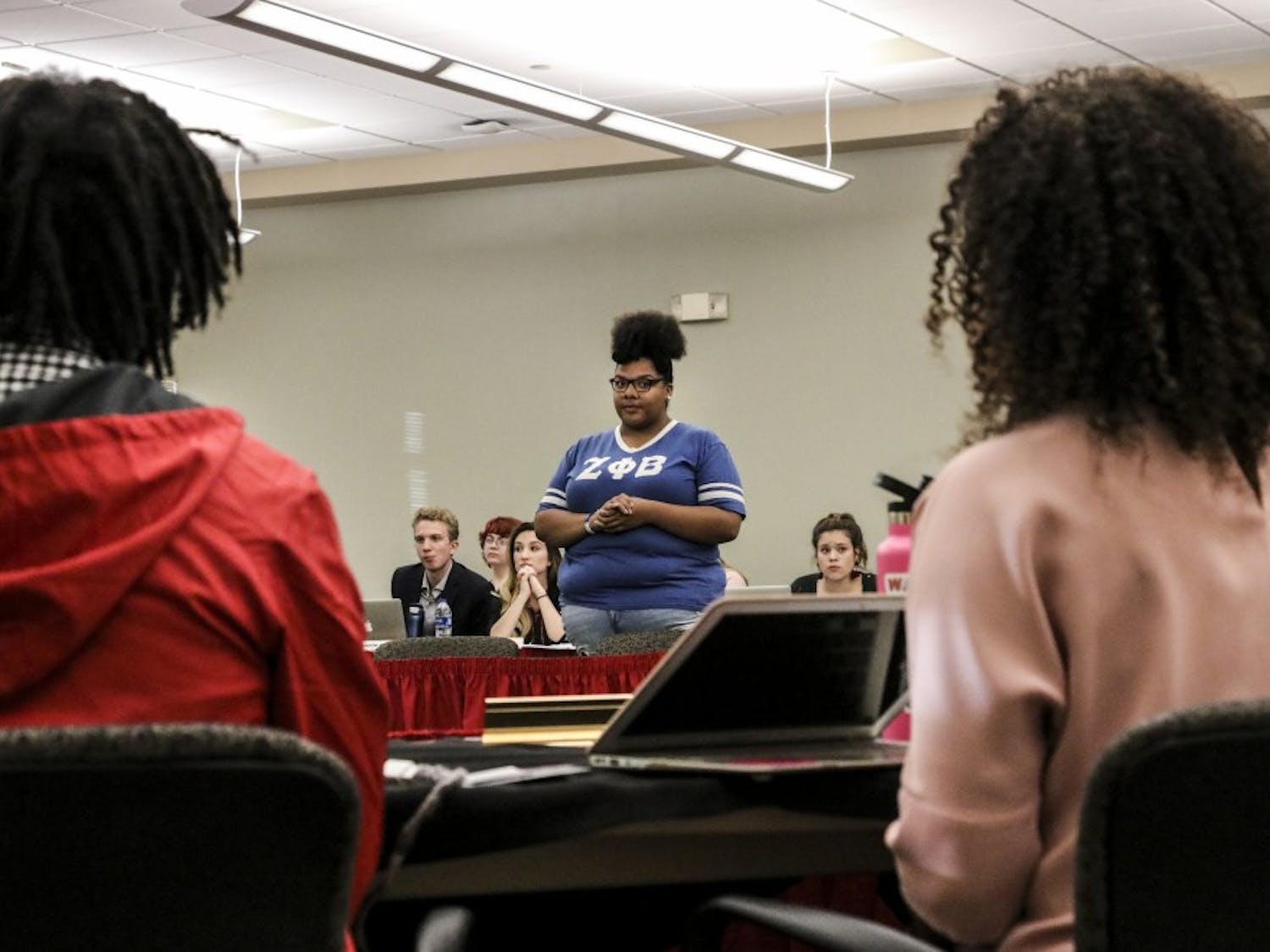 Dannelle Kirven talks to the ASUNM Senate Wednesday night about recent racialized comments made by members of Kappa Kappa Gamma.