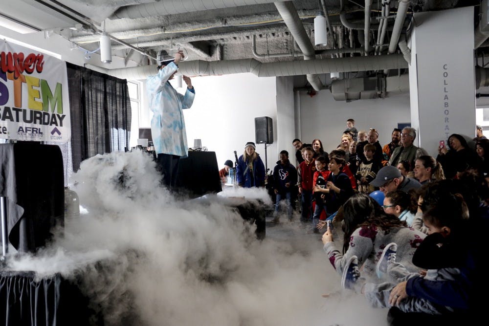 Kids gather as they see a nitrogen bomb in front of them at the Lobo Rainforest on Feb. 24, 2018.&nbsp;