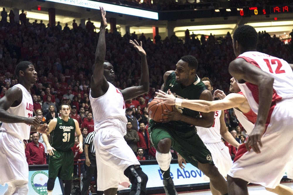 Colorado State forward Tiel Daniels drives past New Mexico defenders during the Jan. 3 game at WisePies Arena in Albuquerque, N.M.